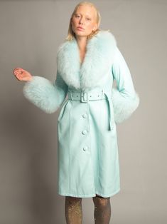 Color: Baby Blue Fur-trimmed collar Long sleeves; fur cuffs Belted waist; belt loops Button-front placket Side welt pockets A-line silhouette Midi-length hem Lamb leather Polyester lining Sample Size: S Delicate dry clean Protect accessories before washing Made-to-order (MTO) style Please allow additional 3-5 days for MTO order to be processed Style № ZC_NYC23_Foxy Leather Coat w/ Fox Fur In Baby Blue Styled with Z' Diamante Detail Over The Knee Boot Fur Cuffs, Knee Boot, Denim Blazer, Tweed Blazer, Double Breasted Blazer, Leather Blazer, Swimwear Sale, Girly Fashion, Fox Fur