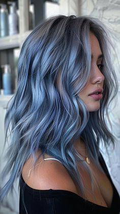 26 Blue Hair Colors to Chill Out Your Style Blue And Grey Hair Color, Light To Dark Blue Hair, Blue Shades Hair Color, Light Blue And Brown Hair, Steel Blue Hair Color, Cool Tone Blue Hair, Subtle Blue Hair, Blue Hair With White Highlights, Blue Fade Hair