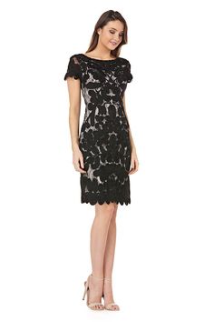 This knee length wedding guest party guest will leave you looking stylish and elegant. This form-fitting pencil skirt flows smoothly over the waist and hips. Pair with neutral heels and dainty jewelry. Novelty, two-tone, soutache embroidery on lace cocktail dress. Body: 100% nylon Lining: 100% polyester Short sleeves Knee length hem Fitted straight silhouette Scalloped hem Wide round neckline Color: Black & Vanilla Brand new, with tags, never worn! Retail price: $325 Embroidery On Lace, Art Deco Gown, Soutache Embroidery, Embroidered Cocktail Dress, Black Ruffle Top, Neutral Heels, Lace Cocktail Dress, Floral Silk Scarf, Beaded Chiffon