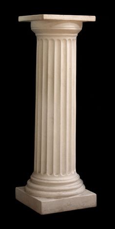 a white marble pedestal on a black background