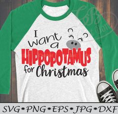 a green and white shirt with the words i want hippopmus for christmas