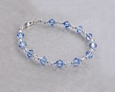 "Light sapphire blue crystal bracelet is made with light sapphire and clear Austrian crystals separated by tiny silver beads. Sterling silver lobster clasp. ❖ Austrian crystals ❖ sterling silver ❖ silver fill Bracelet shown is 7.5\" in length." Blue Faceted Crystal Bracelets, Blue Beaded Crystal Bracelet In Sterling Silver, Blue Beaded Sterling Silver Crystal Bracelet, Blue Faceted Crystal Bracelet Gift, Blue Faceted Crystal Bracelet For Gifts, Blue Sterling Silver Beaded Bracelets With Faceted Beads, Light Blue Bracelet, Blue Crystal Bracelet, Light Sapphire