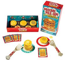 a play food set with pancakes and other items