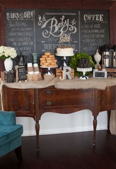 a baby shower is set up with coffee and cakes