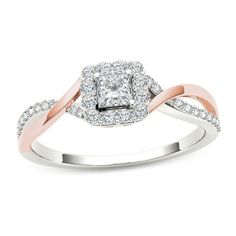 an engagement ring with two tone gold and white diamonds on the band, featuring a square cut