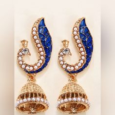 “Peacock Jhumkas” Royal Blue Pearl Adorned Regal Elegant Indian Bell Bowl Gold Ornate Elaborate Stud Post Dangle Earrings. So Gorgeous! New. Measurements: Eardrop Length: 2” Earring Width: 0.8” If You Want It, Don’t Let It Get Away Send Me An Offer! I Love To Do Bundle Order Discounts! Blue Jhumkas For Festive Occasions, Blue Jhumkas With Latkans For Diwali, Blue Bohemian Jhumkas For Festive Occasions, Diwali Blue Jhumkas With Latkans, Blue Earrings For Diwali, Festive Blue Bohemian Jhumkas, Festive Bohemian Blue Jhumkas, Festival Peacock Design Jhumkas For Parties, Peacock Design Jhumkas For Party And Festivals