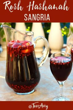 a pitcher and two glasses filled with sangria