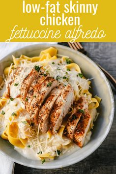 chicken fettuccine alfredo in a bowl with text overlay