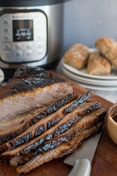 the meat is sliced up and ready to be cooked in the instant pressure cooker