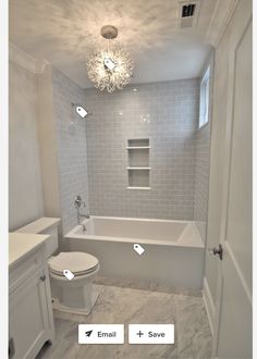 the bathroom is white and has gray tile on the walls, floor, and ceiling