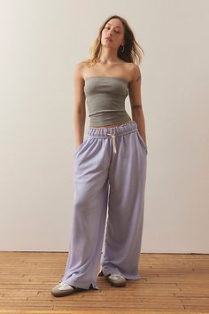 Wardrobe-staple sweatpants by Out From Under that you'll reach for again and again. Cut from fabric with an ultra-soft feel in a slouchy fit we love with a mid-rise and a baggy wide-leg. Finished with side-split hems. Find it exclusively at UO. Features Out From Under sweatpants made to be lived in Relaxed slouchy fit Pull-on with easy side pockets UO exclusive Content + Care 58% Cotton, 42% polyester Machine wash Imported Size + Fit Model in Grey is 5’7" and wearing size Small Measurements take Wide Leg Sweatpants Outfit, Baggy Sweatpants, Purple Fits, Sweatpants Outfit, Wide Leg Sweatpants, Summer Mood, Side Split, Cute Fits, Pic Ideas