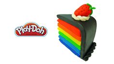 a cake shaped like a strawberry on top of a rainbow colored piece of paper with the word play doh written below it