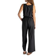 Made from super soft, lightweight stretchy fabric, this jumpsuit is designed to be worn for any season or occasion, making it a staple in your wardrobe. The flattering relaxed fit and wide-leg style with side pockets add a touch of casual sophistication, while the open V-neck and elastic waistband with a drawstring tie create a flattering silhouette that complements any body type. Dress it down with your favorite sandals for a laid-back daytime look or dress it up with wedges and sparkling state Relaxed Fit Jumpsuit With Elastic Waistband For Loungewear, Casual Wide Leg Jumpsuits And Rompers For Loungewear, Casual Strapless Jumpsuit With Pockets, Casual Wide-leg Jumpsuit For Loungewear, Solid Maxi Length Jumpsuits And Rompers For Loungewear, Maxi Length Jumpsuits And Rompers For Loungewear, Wide Leg Stretch Jumpsuits And Rompers For Loungewear, Casual Strapless Jumpsuit For Spring Loungewear, Stretch Wide Leg Jumpsuits For Loungewear