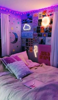 a bedroom with pink and purple lights on the ceiling, bed in front of window