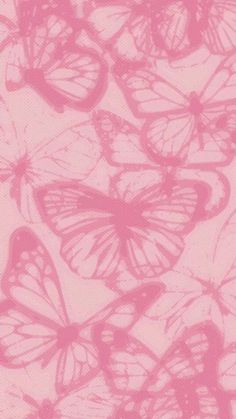 pink butterflies are flying in the air on a light pink background with white outlines