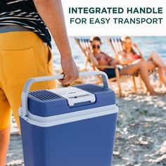 a man holding a cooler on the beach with people sitting in chairs behind him and text that reads, integrated handle for easy transport