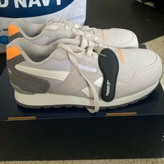 Nwt Reebok Composite Work Sneakers Size 7w Gray White Orange Steel Tie Casual Orange Slip-resistant Sneakers, Orange Sneakers With Ortholite Insole For Errands, Orange Low-top Slip-resistant Sneakers, Orange Slip-resistant Low-top Sneakers, Orange Sneakers, Work Sneakers, Reebok Shoes, Womens Reebok, Womens Shoes Sneakers