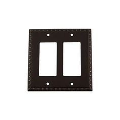 the double rocker wall plate is black and has two plates on each side, one with an ornate design