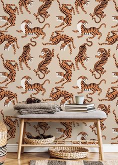 the wallpaper in this room is decorated with orange and black tiger stripes on it