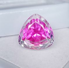 9.60 Ct Natural White & Pink Color Earth Mined Pitambari Sapphire Jewelry Purpose Stone  Pitambari Trillion Cut Loose Gemstone Gift Her JM295  Variety/Species: Pitambari Sapphire * CARAT WEIGHT: 9.60 Ct * Dimensions : 12 x 12 x 9 MM Approx * Quantity: 1pc(s) * Origin: Sri Lanka * Shape/Cutting Style: Trillion Cut Shape as shown in pictures * Calibrated: Yes * Treatment: None We do not deal in synthetic Pitambari Sapphire which is treated with any treatment method that is not accepted by the fine Sapphire Jewelry, Cut Loose, Pink Sapphire, Stone Jewelry, Sri Lanka, Pink Color, Loose Gemstones, Sapphire, Fine Jewelry