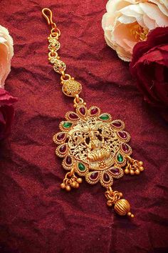 Product Features:   Color: Gold Material: Alloy Product Weight: 75 Gram Occasion: Party Wear Disclaimer: There will be slight difference in digital to actual image Mang Tikka Gold, Gold Maang Tikka, Maang Tikka Design, Tikka Designs, Mang Tikka, Maang Tikka, Stone Studs, Wedding Time, Brown Floral