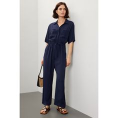 Navy crepe (53% Viscose, 47% Rayon). Jumpsuit. Short sleeves. Collared. Front button closure. 55.5" from shoulder to hemline. 25.5" inseam. 15.5" rise. 21" leg opening. Imported. Jumpsuit Short, Navy Jumpsuit, Short Sleeve Jumpsuit, Short Sleeve Jumpsuits, Rent The Runway, Closet Designs, Jumpsuit With Sleeves, Navy Shorts, Navy Color