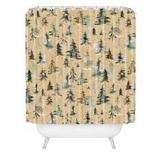 a shower curtain with trees and snow on the ground in front of an orange background