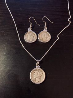 "Wear an iconic piece of American history with this authentic mercury dime earrings and necklace set! \"Mercury\" dimes were minted by the United States government from 1916 to 1945 and feature a bust of a young Lady Liberty wearing a winged cap, similar to the Roman god Mercury. These coins are made of 90% silver and 10% copper, standard for U.S. coins of the era.  Since being replaced by Roosevelt dimes in circulation, these coins have become a favorite of collectors. Now, you can own and wear God Mercury, Necklace Set Silver, Earring And Necklace Set, Being Replaced, Earrings And Necklace Set, Coin Earrings, Lady Liberty, Earrings And Necklace, Etsy Favorites