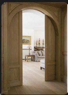 an open door leading into a living room