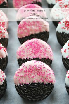 chocolate dipped oreos with pink and white sprinkles