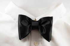 "Black tie event Bow tie, Oversized Bow tie, Tom ford style, Silk black bowtie New Way Creation Design pre tied and adjustable silk handmade bowtie Color: Black & other option - please see before checkout. Fabric type: Satin Silk (shiny) Dimension: 1. Adult size: 4.75/3.15\" (12 / 8 cm), 2. Child size: 3.95/2.36\" (10/6 cm) or 3. Infant size: 3.15/1.57\" (8/4 cm) Adjustable strap: yes, up to 18\" aprox (for adult). Please let me know if you need it longer We offer free of charge custom initi Black Bow Tie With Bow Tie Back, Black Standard Tie With Bow, Classic Black Bow Tie And Suit Accessories, Classic Black Bow Tie And Accessories, Classic Black Bow Tie Suit Accessories, Classic Black Suit And Bow Tie Accessories, Dapper Black Bow With Ties, Black Bow Suit And Tie Accessories For Business, Classic Black Bow Suit And Tie Accessories