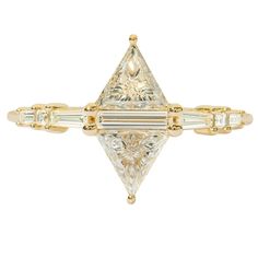 a yellow gold ring with a triangle shaped diamond in the center and baguets on each side