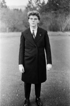 This is a beautiful example of a formal frock coat about 1900 - 1910. It is fully lined with fluffy silk padding. The wool exterior is not coarse like other jackets from the time but very soft. Both the surgeon buttons and closure buttons are silk covered with a design more intricate than most. There are no odors and no tears in the lining or sleeves. However, there are two of the 4 front buttons missing. There is a small faint stain on the bottom left corner as well.  Shoulders seam to seam: 16 Victorian Style Formal Long Coat, Frock Coat, Black Wool, Sport Coat, Mens Suits, Double Breasted, High Quality, Favorite Outfit, Art Collection