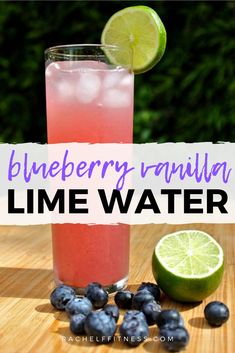 blueberry vanilla lime water in a tall glass with lemon wedges on the side