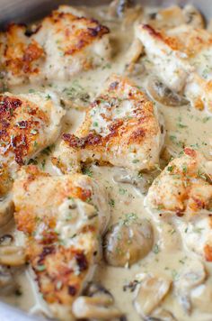 chicken with mushrooms and gravy in a skillet ready to be eaten or cooked