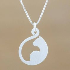 Cat lovers will adore this wonderful pendant necklace from Thailand with its beautiful silhouette of a cat elegantly curving its tail around itself. Artisan Sarote Lochotinunt handcrafts this pretty pendant necklace from sterling silver completing the elegant design with a shimmering brushed-satin finish. Jar Jewellery, Jewellery Website, Silver Cat Pendant, Jewellery Shops, Cat Pendant Necklace, Silver Diamond Necklace, Sterling Silver Cat, Cat Pendant, Silver Jewelry Necklace