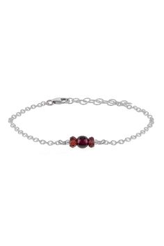 This dainty garnet gemstone bracelet is our most light and comfortable bracelet yet - you'll never want to take it off! The three small but powerful crystals used in this bracelet are subtle but mighty, connecting you with their metaphysical energies though the lightest touch. Wear either alone for a elegant look or stacked with your other favourite crystal bracelets for extra impact. Adjustable Garnet Gemstone Bracelets, Adjustable Garnet Gemstone Bracelet, Elegant Sterling Silver Healing Crystal Bracelet, Elegant Healing Bracelet With Birthstone, Elegant Adjustable Garnet Bracelets, Powerful Crystals, Zodiac Stones, Take It Off, Garnet Bracelet