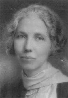 an old black and white photo of a woman