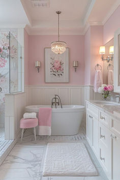 a bathroom with pink walls and white fixtures