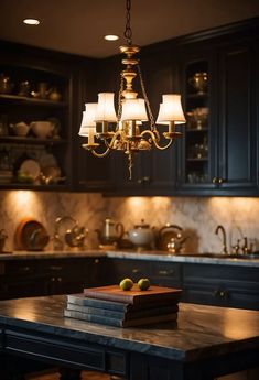 a chandelier hanging from the ceiling in a kitchen