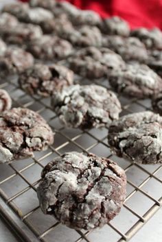 chocolate crinkle cookies cooling on a wire rack