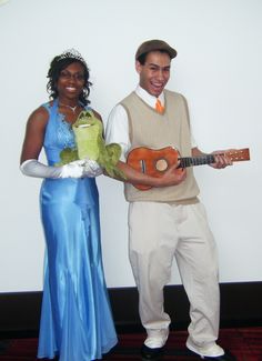 a man and woman dressed up as princess and the frog with a ukulele