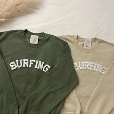 This Surfer Crewneck Sweatshirt is the perfect gift for surfers or surfer lovers!  - They need to be purchased individually (it's not sold as a set) - Sweatshirt material is super soft and comfy! ♡ - All our sweatshirts run a UNISEX fit. (Both for men and women) They are naturally oversized, so we normally recommend your true size. But if you like a more baggy look, we recommend sizing up. - These letters are iron-on patched and is heat pressed, not embroidered. - Please note that crewneck brand Sporty Crew Neck Tops For Surfing, Sporty Screen Print Surfing Tops, Sporty Screen Print Tops For Surfing, Long Sleeve Cotton T-shirt For Surfing, Cotton Graphic Print Sweatshirt For Surfing, Casual Cotton Sweatshirt For Surfing, Cotton Crew Neck Sweatshirt For Surfing, Casual Cotton Sweatshirt, Graphic Print Crew Top For Surfing