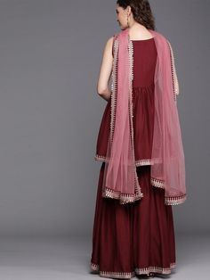 Buy superior maroon embroidered kurta with sharara and net dupatta. for women which is crafted from silk blend fabric with beautiful trendy style and pattern. Bollywood Style Burgundy Dupatta In Traditional Drape, Bollywood Style Burgundy Dupatta, Bollywood Burgundy Dupatta With Zari Work, Burgundy Traditional Wear With Dupatta For Festivals, Burgundy Zari Work Sets For Diwali, Semi-stitched Burgundy Sets For Festive Occasions, Burgundy Sets With Zari Work For Eid, Burgundy Semi-stitched Sets For Festive Occasion, Bollywood Style Festive Burgundy Sets