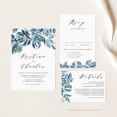 wedding stationery suite with blue flowers and calligraphy on the front, back and inside