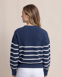 We're falling for the Haisley Stripe Crewneck Sweater. The relaxed fit with ribbed hems offers effortless comfort and timeless fall style. The rich color palette and stripes add personality to any outfit you create with the Haisley Sweater. Style: 11111 Fall Tops With Striped Cuffs And Relaxed Fit, Striped Relaxed Fit Sweater For Loungewear, Striped Sweater For Fall Loungewear, Navy Sweater With Ribbed Cuffs For Spring, Striped Cotton Sweater With Ribbed Collar, Fall Workwear Sweater With Striped Hem, Striped Cotton Sweater With Ribbed Detail, Striped Ribbed Cotton Sweater, Cotton Sweater With Striped Hem For Fall