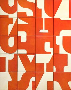 an orange and white painting with letters on it