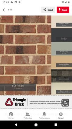 a brick wall with different colors and sizes on the bottom right hand corner is shown