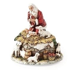 Kneeling Santa With Baby Jesus Musical Christmas Figure  Plays Come All Ye Faithful Santa Images, Kneeling Santa, Santa Statues, Santa Collection, Wooden Santa, Meaning Of Christmas, Christmas Jesus, Christmas Central, Holding Baby