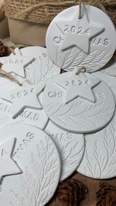 white ceramic christmas ornaments on a wooden table